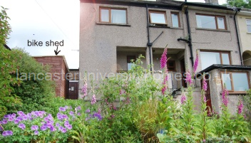 Back of house, bike shed and garden