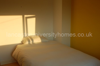 Yellow bedroom upstairs