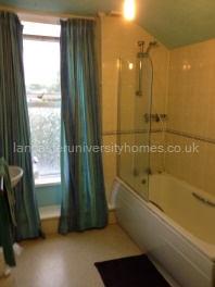 Bigger bathroom with bath, shower, basin & toilet. 