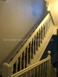 Newly painted hallway and bannister rail
