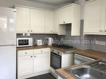 Very modern, shiny kitchen!