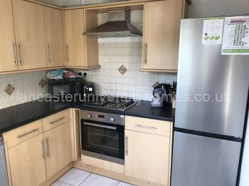 Kitchen with loads of cupboard space. Dishwasher. New fridge-freezer and separate fridge.
