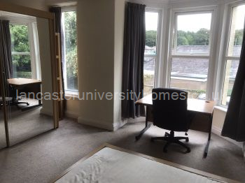 Middle floor, front bedroom. Biggest room in the house. Huge mirrored wardrobe with king-size Ikea bed.