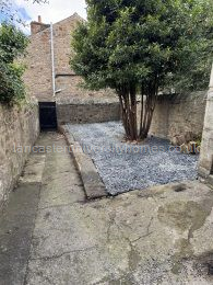 Back yard, newly gravelled in summer of 2025.