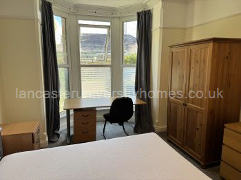 Also ground-floor front bedroom - privacy film on lower windows