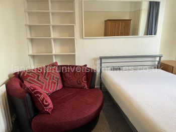 Ground floor, front bedroom. Very spacious with massive snuggle chair.